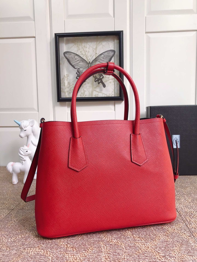 Pra*a top handle bags